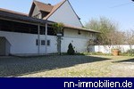 grozgiger Innenhof mit Schopf