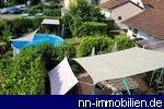 Grundstcksansicht - Terrassenbereich von der EG-Whg. - Nebengebude