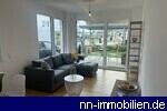 Wohnbereich mit Zugang zur Terrasse